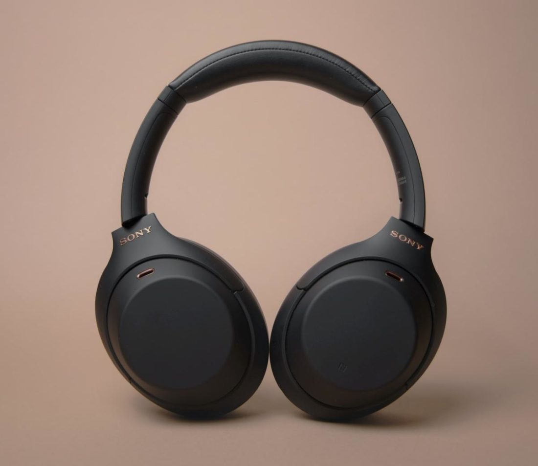 A pair of headphones with a built-in mic. (from: Unsplash)